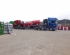 Load of Muckspreaders and Bale Trailers