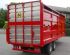 Rear view of 21' Marshall livestock trailer with a steel container.