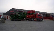 Marshall MAN Lorry Leaving with a Load of Bale Trailers