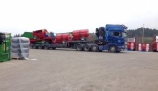 Load of Muckspreaders and Bale Trailers