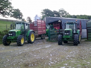 Three Marshall Trailers with Silage Sides in Action