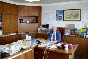 Charles J Marshall - Pictured at his desk