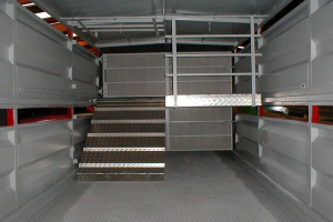 Removable sheep decks, with internal loading ramps and partitions in a Marshall livestock trailer.