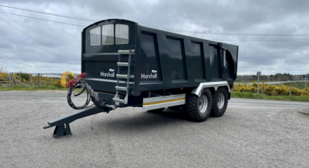 QM1400 - 14.5ton, 10 stud commercial axles, 560-60x22.5 flotations, load sensing air/oil brakes, grain hatch, side marker lights, full width front window, gun-metal grey