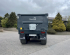 QM1400 - 14.5ton, 10 stud commercial axles, 560-60x22.5 flotations, load sensing air/oil brakes, grain hatch, side marker lights, full width front window, gun-metal grey