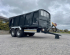 QM1400 - 14.5ton, 10 stud commercial axles, 560-60x22.5 flotations, load sensing air/oil brakes, grain hatch, side marker lights, full width front window, gun-metal grey