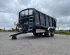 QM1400 - 14.5ton, 10 stud commercial axles, 560-60x22.5 flotations, load sensing air/oil brakes, grain hatch, side marker lights, full width front window, gun-metal grey