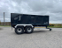 QM1400 - 14.5ton, 10 stud commercial axles, 560-60x22.5 flotations, load sensing air/oil brakes, grain hatch, side marker lights, full width front window, gun-metal grey