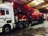 Lorry Load of Spreaders and a Tanker